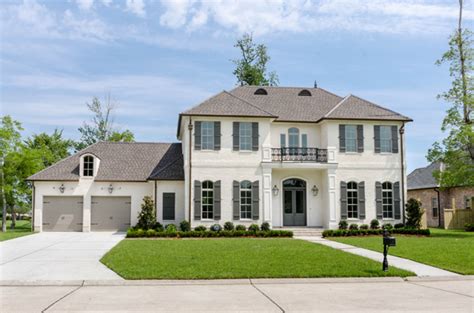 Homes with 5 bedrooms usually need to have at least 2,700 sf of living space. five-bedroom french country house plan