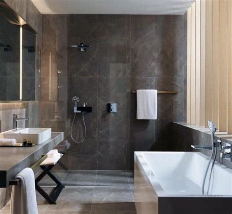 Walls, decorated with white and pale grey tile and black sanitaryware. Top 60 Best Grey Bathroom Tile Ideas - Neutral Interior ...