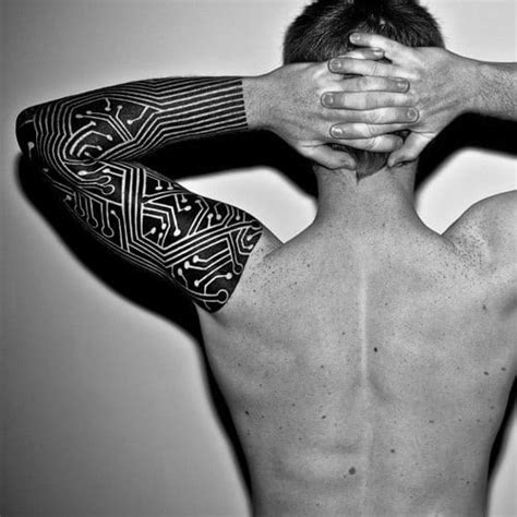 Our company started as a humble home business fixing and building tattoo machines. 70 All Black Tattoos For Men - Blackout Design Ideas