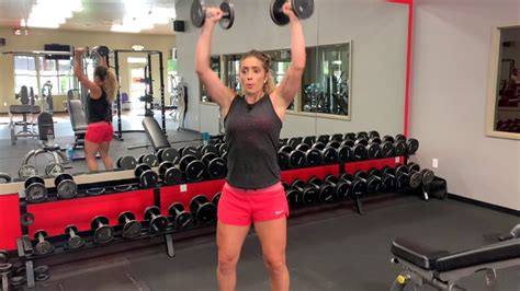 Hold a dumbbell in each hand, place them on your thighs and sit on a bench with a back support (adjust an incline bench if necessary). Standing Dumbbell Shoulder Press - YouTube