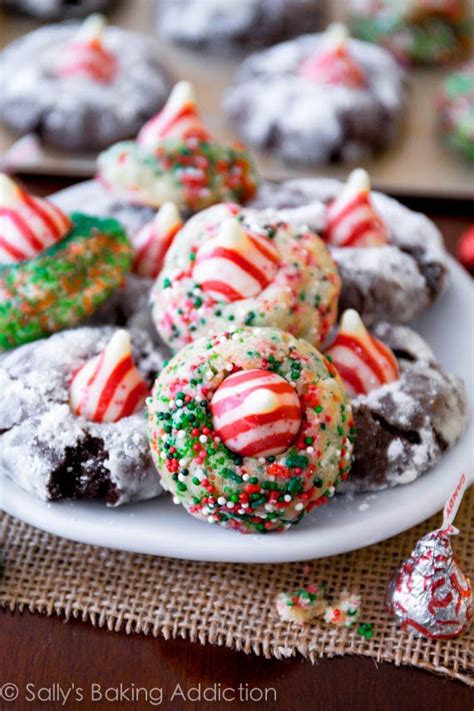 Carefully remove from oven and gently push an m&m piece into the hershey kiss. Candy Cane Kiss Cookies - Sallys Baking Addiction
