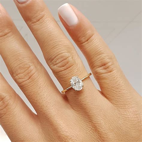 18 karat yellow gold ring by deborah murdoch is from the abundance collection featuring an oval 3.00ct diamond stone. Yellow Gold 0.9 Ct Oval F - Vs2 Solitaire Diamond 14k ...