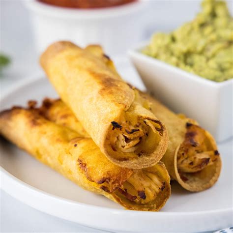 Baked Chicken Taquitos Corn Tortillas Filled With Seasoned Chicken And Cheese Then Baked To