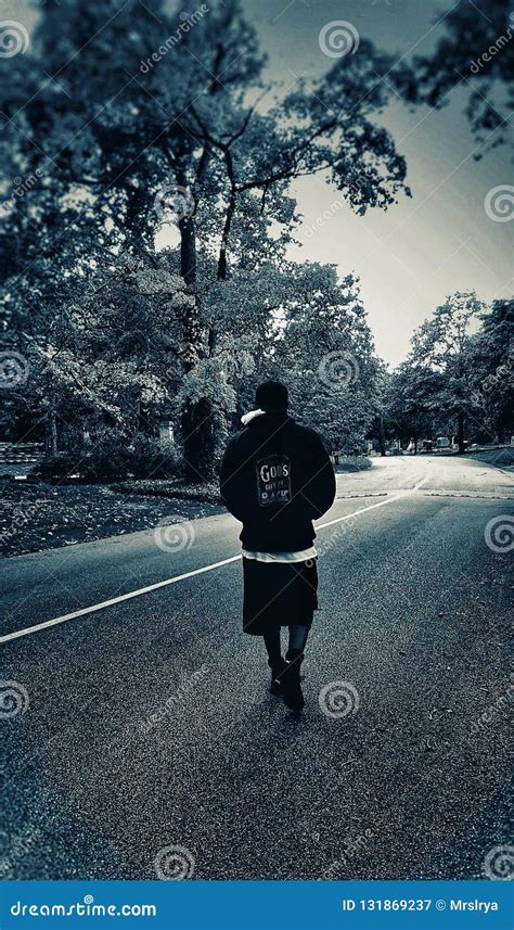 Man Walking Alone On A Road Stock Image Image Of Human Tree 131869237