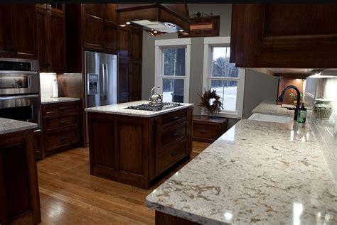 Dark kitchen cabinets and countertops with white backsplash. Pin by Julia Bartus-Edwards on kitchen remodel ...