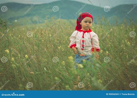 Cute Toddler Girl With Funny Face In A Meadow Stock Image Image Of