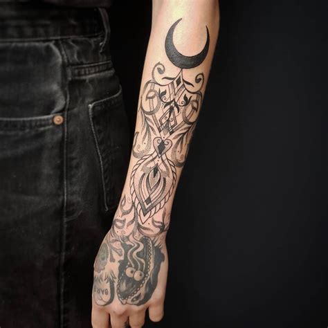Ornaments And Crescent Moon Tattoo On The Left Forearm Crescent Moon Tattoo Crescent Moon