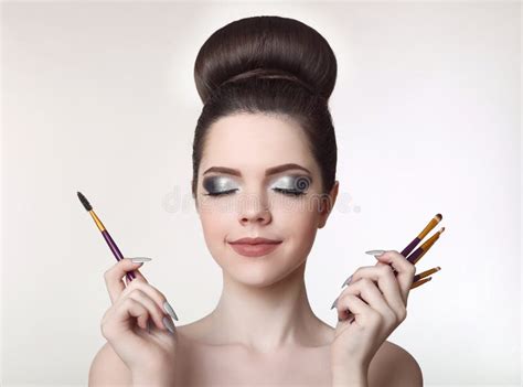 Makeup Artist Pretty Teen Girl With Cute Bun Hairstyle And Fashion