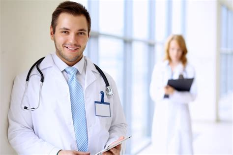 Premium Photo Smiling Doctor Man