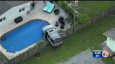 suv crashes into fence of dania beach home barely misses going into pool wsvn 7news miami
