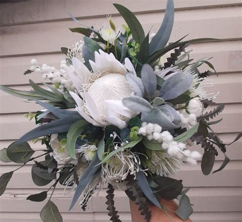 We are leading faux wedding bouquets supplier in throughout the australia.for more information visit at countryaccentfloralboutique.com. White wedding bouquet. Rustic native faux flowers. Bride ...