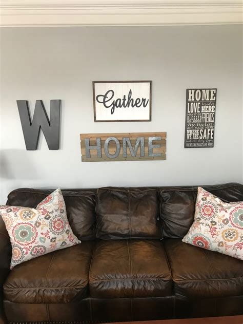 Gray walls in and of themselves can be a bit uninteresting. Repose grey by Sherwin Williams on walls. Love it with the brown couch. | Brown living room ...