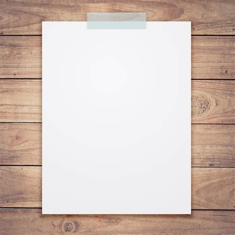 Premium Photo Empty White Paper Sheet On Wood Background