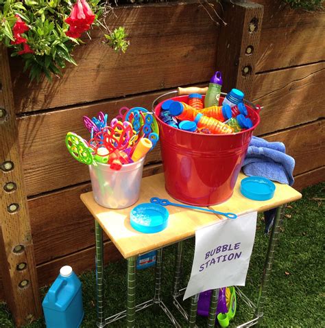 Here are some fun ideas for birthday games for kids. Backyard bubble station at my daughter's first birthday ...