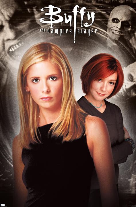 Two Women Standing Next To Each Other In Front Of A Poster For The Movie Buffy