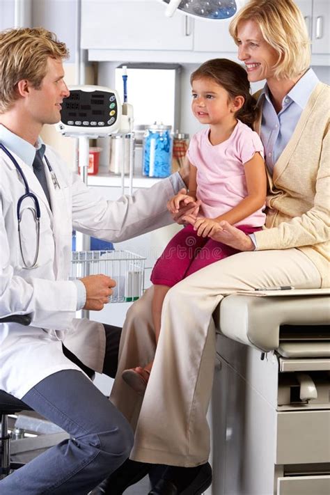 Mother And Child Visiting Doctor S Office Stock Image Image Of Exam