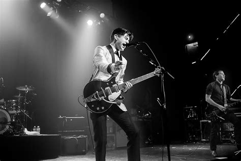 I love alex turner more than he loves himself. Arctic Monkeys Photo - The Hottest Live Photos of 2013 | Rolling Stone