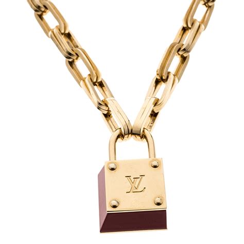 Includes a free jewelry bag check out our profile for similar items free shipping anywhere in the us! Louis Vuitton Lock'N'Roll Red Enamel Gold Tone Necklace Louis Vuitton | TLC