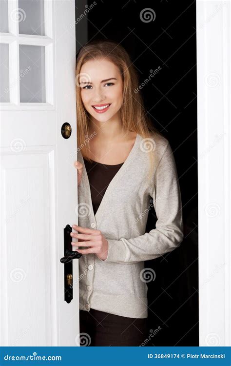 Beautiful Caucasian Woman Standing By The Door Stock Photo Image Of