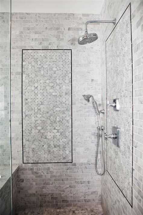 A Glass Shower Enclosure Is Fixed In Front Of A Walk In Shower Donning Gray Marble Mini Wall