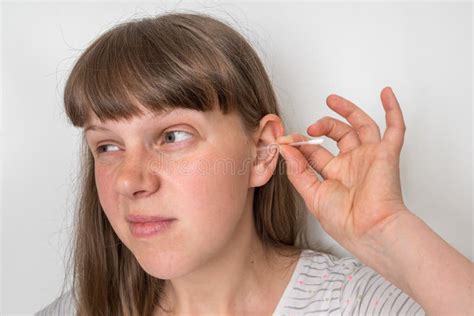Woman Cleans Her Dirty Ears With Cotton Swab Stock Photo Image Of
