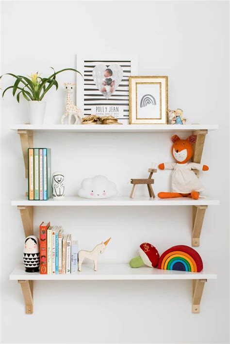 We've kept it at a lower height so that it's easily accessed by children, but the longer length works really well in larger spaces. A Tiny Nursery with Huge Style | Kids room shelves ...