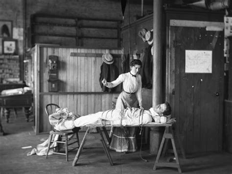 woman standing over bound man photograph wisconsin historical society