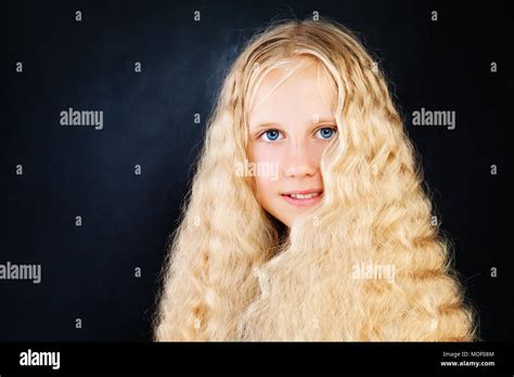 Little Girl With Wavy Blonde Hair