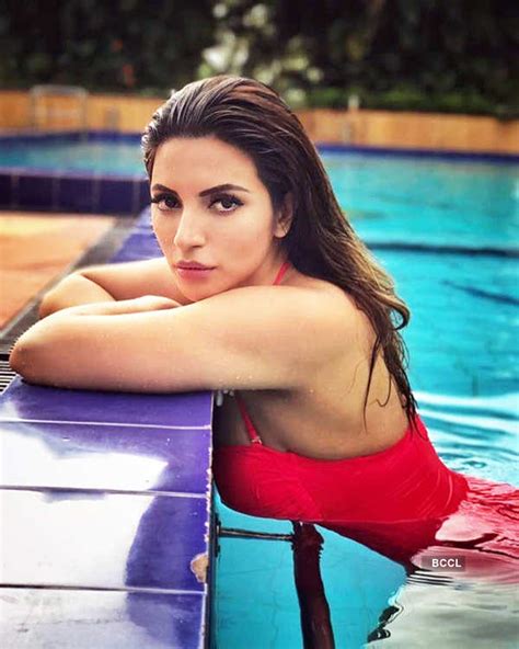 shama who has raised temperatures in her bold avatar slays it in style in a bikini photogallery