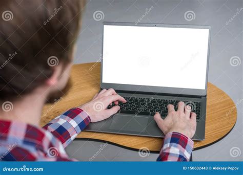 Man Hands Typing On Laptop Keyboard With White Blank Screen Mockup