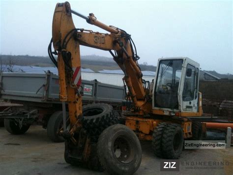 Maintenance is quick and easy on the cat mini excavator. Liebherr A 310 EXCAVATOR ** ** 1993 Mobile digger ...