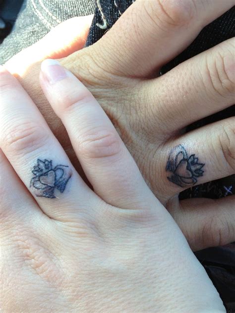 The claddagh is a symbol created by coalescing three facets. Happy Anniversary! Claddagh wedding bands | Ring tattoos ...
