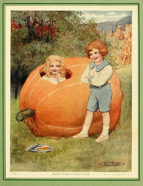 Two Children Standing Next To Each Other In Front Of A Large Pumpkin