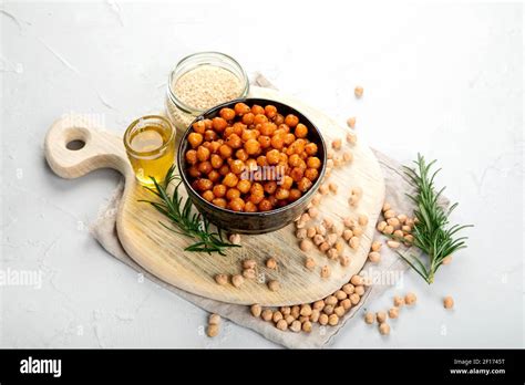 Vegan Healthy Snack Homemade Roasted Chickpeas In Bowl On Light Gray