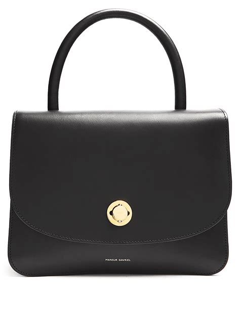 Click here to buy Mansur Gavriel Metropolitan top-handle leather bag at MATCHESFASHION… | Real ...