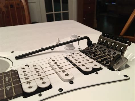 Guitar whammy bar tricks the whammy bar on your electric guitar is capable of creating a wide variety of great sounding effects and tricks! Why is my whammy bar so low? : guitars