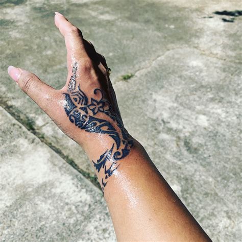Stunning Polynesian Hand Tattoo