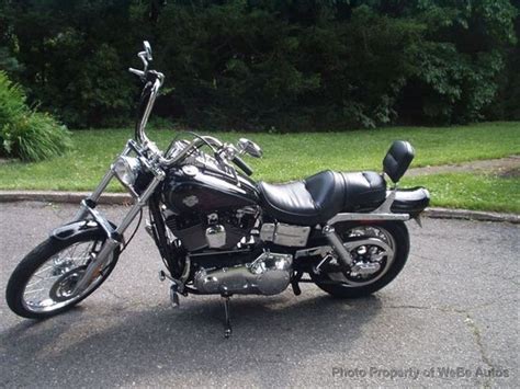 25596 miles vivid black samson exhaust apes braided cables passenger backrest 5 gallon tank 5 speed transmission 88 motor. 2004 Used HARLEY-DAVIDSON FXDWG Wide Glide at WeBe Autos ...