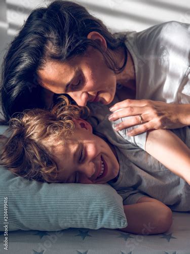 Mother Touching Sleeping Son Stockfotos Und Lizenzfreie Bilder Auf
