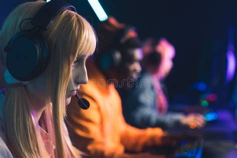 Group Of Online Gamers Focus On The Foreground Beautiful Blonde