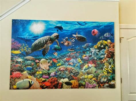 Get that gallery wall up in no time. How to Mount and Hang a Large #Jigsaw #Puzzle Without Glue ...