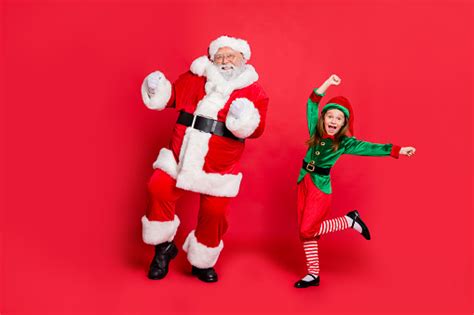 Full Body Photo Of Excited Two Santa Claus In Hat Headwear