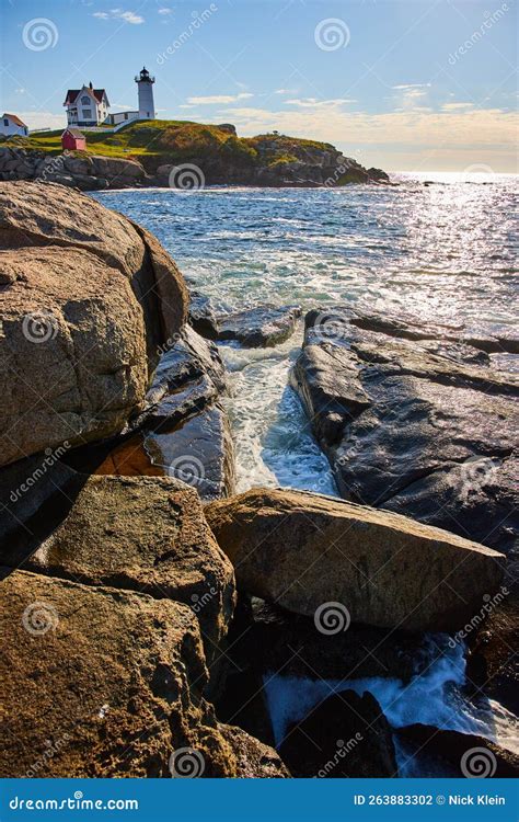 Rocky Coasts Of Maine With Crevices Filled By Ocean Waves And