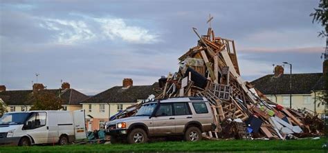 Fears Over Out Of Control Bonfire As Kids Clamber On Top To Stack
