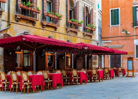 Traditional Outdoor Restaurant In An Old Courtyard In Venice Italy