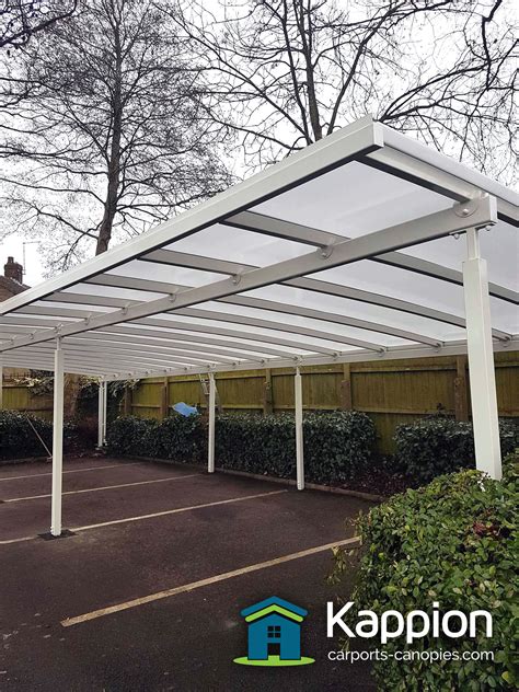 From mazes to bouncing nets, it's all fun. Car Park Canopy Installed in Derbyshire | Kappion Carports ...