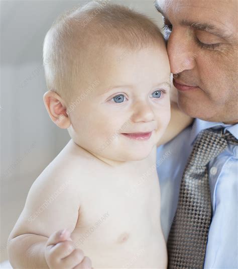 Father Holding Baby Stock Image F0143273 Science Photo Library
