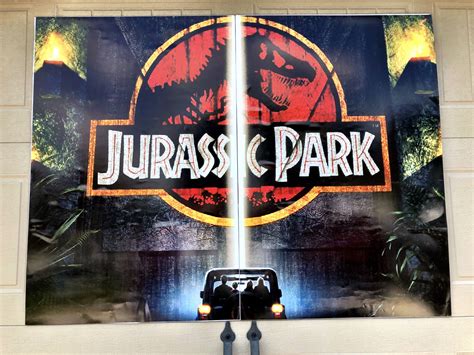 The Jurassic Park Entryway Posters On The Garage Doors Photography By