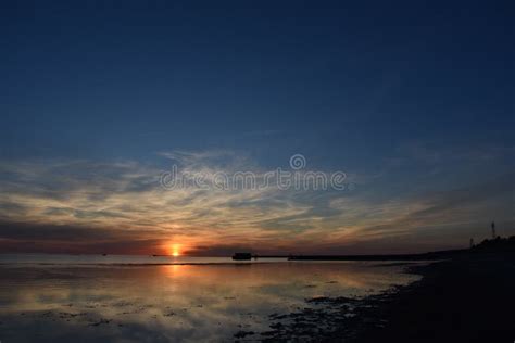Beautiful Orange Sunset Sky Reflection On Calm Sea Stock Image Image