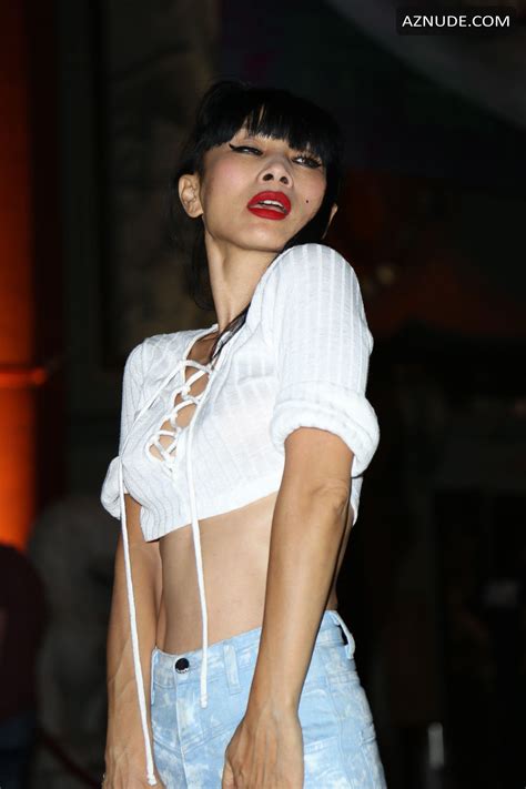 Bai Ling Braless In A White Top And Ripped Jeans In Los